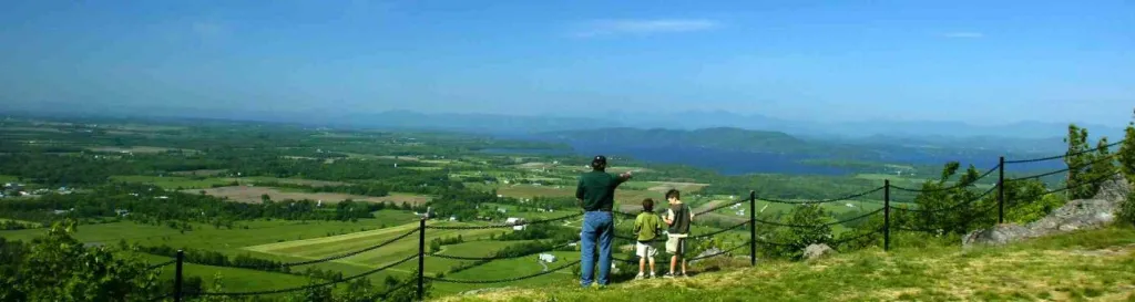 Father and kids overlooking Mt. Philo